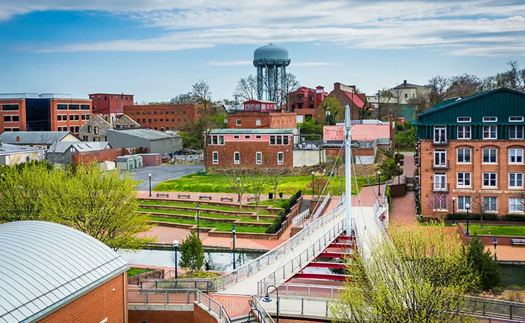 Deep Local Roots Frederick Maryland skyline with water tower in the distance.